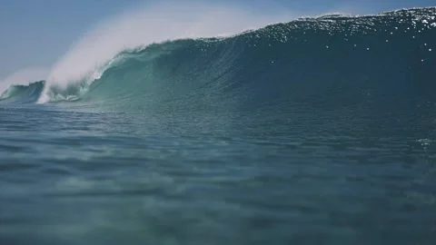 Big wave breaking and passing by Stock Footage 260691284