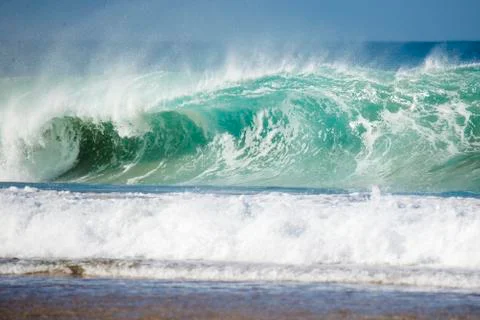 Big wave that breaks on the coast Stock Photos