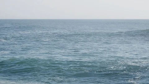 A big wave forms and then breaks on the blue ocean Stock Footage 105164987