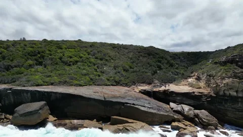 Big wave hits cliff Stock Footage 229506676