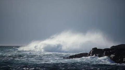 Big wave hitting the shore during the windy day Stock Footage 318513828