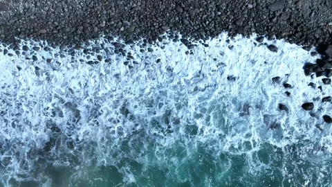 Big Wave Rolling In on Black Stone Beach – Dramatic Coastal Drone Footage Stock Footage 309951017