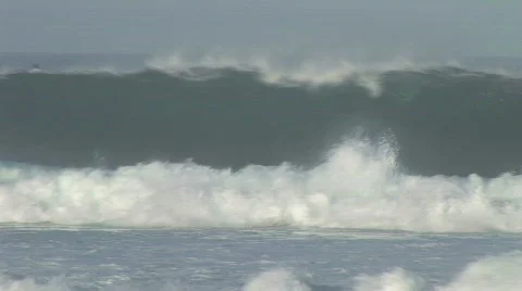 Big wave spits Motion JPEG Stock Footage 800534