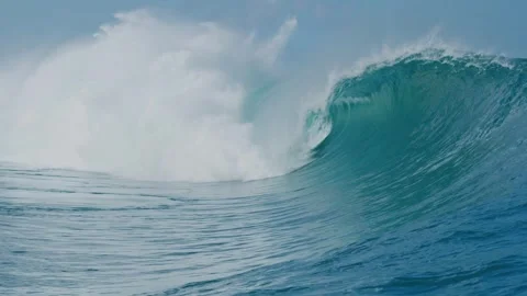 Big wave surf in clear weather with strong wind, Beautiful turquoise sea waves Stock Footage 336585853