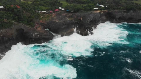 Big waves and a cliff | Nusa penida | 4k drone video Stock Footage 167344729