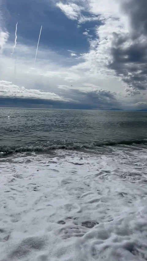 Big waves and clouds Stock Footage 237232684