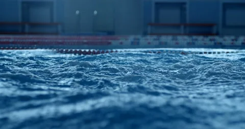 Big waves like boiling water in a swimming pool after professional swimmer swam Stock Footage 119551827