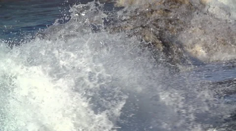 The big waves break against the shore. Slow Motion Stock Footage 53375413