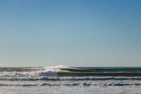 Big Waves break in the Pacific Ocean on a California beach Stock Photos