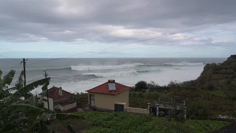 Big waves breaking on the coast Stock Footage 128304960