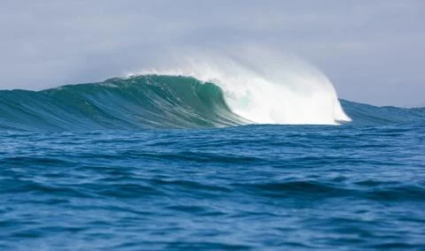 Big waves breaking on an reef along the coast of South Africa Stock Photos
