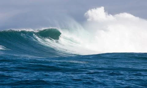 Big waves breaking on an reef along the coast of South Africa Stock Photos