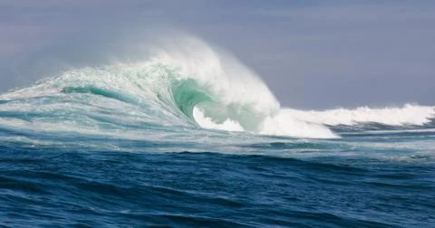 Big waves breaking on an reef along the coast of South Africa Stock Photos