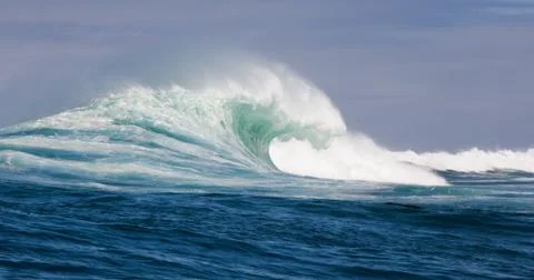 Big waves breaking on an reef along the coast of South Africa Stock Photos