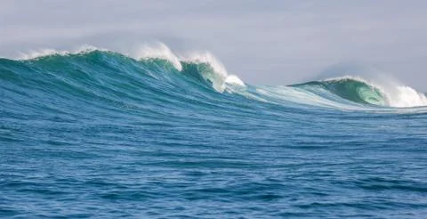 Big waves breaking on an reef along the coast of South Africa Stock Photos