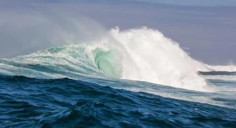 Big waves breaking on an reef along the coast of South Africa Stock Photos
