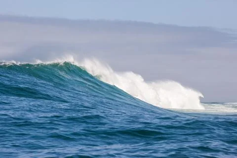 Big waves breaking on an reef along the coast of South Africa Stock Photos