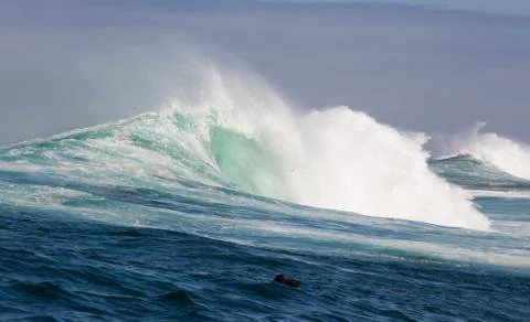 Big waves breaking on an reef along the coast of South Africa Stock Photos