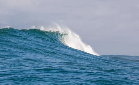 Big waves breaking on an reef along the coast of South Africa Stock Photos