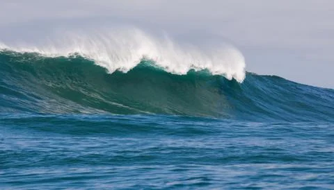 Big waves breaking on an reef along the coast of South Africa Stock Photos