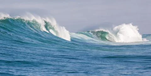 Big waves breaking on an reef along the coast of South Africa Stock Photos