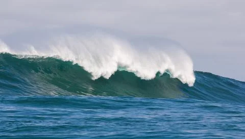 Big waves breaking on an reef along the coast of South Africa Stock Photos