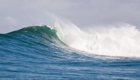 Big waves breaking on an reef along the coast of South Africa Stock Photos