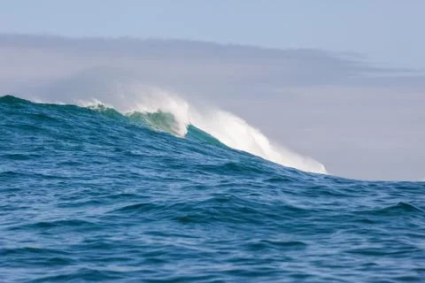 Big waves breaking on an reef along the coast of South Africa Stock Photos