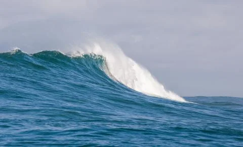 Big waves breaking on an reef along the coast of South Africa Stock Photos