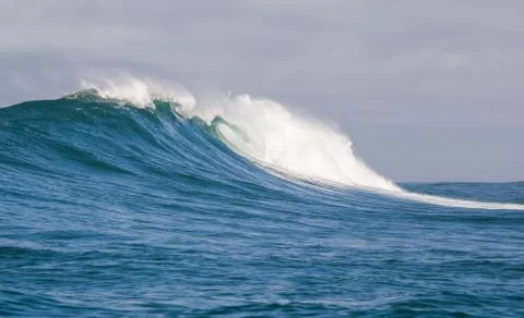 Big waves breaking on an reef along the coast of South Africa Stock Photos