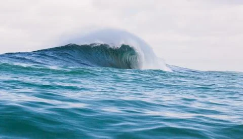 Big waves breaking on an reef along the coast of South Africa Stock Photos