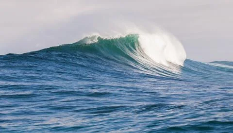 Big waves breaking on an reef along the coast of South Africa Stock Photos