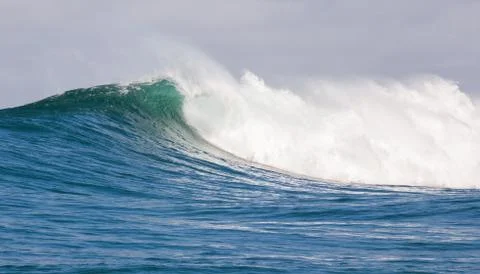 Big waves breaking on an reef along the coast of South Africa Stock Photos