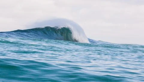 Big waves breaking on an reef along the coast of South Africa Stock Photos