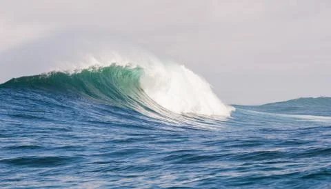 Big waves breaking on an reef along the coast of South Africa Stock Photos