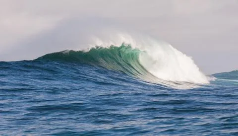 Big waves breaking on an reef along the coast of South Africa Stock Photos