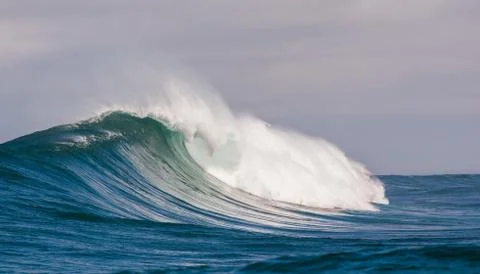 Big waves breaking on an reef along the coast of South Africa Stock Photos