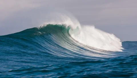 Big waves breaking on an reef along the coast of South Africa Stock Photos