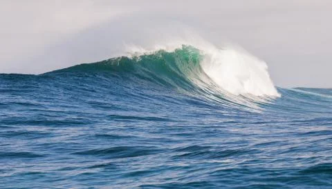 Big waves breaking on an reef along the coast of South Africa Stock Photos