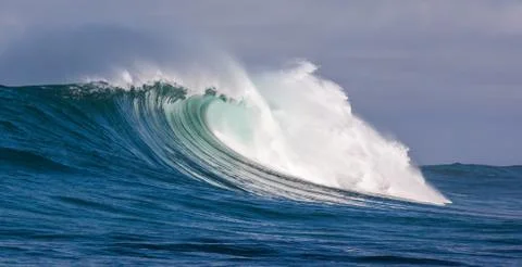 Big waves breaking on an reef along the coast of South Africa Stock Photos