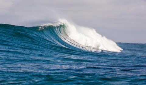 Big waves breaking on an reef along the coast of South Africa Stock Photos