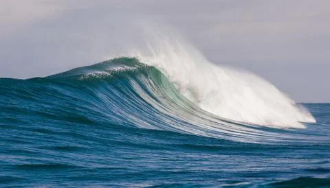 Big waves breaking on an reef along the coast of South Africa Stock Photos