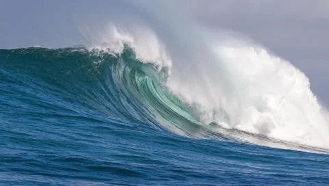 Big waves breaking on an reef along the coast of South Africa Stock Photos