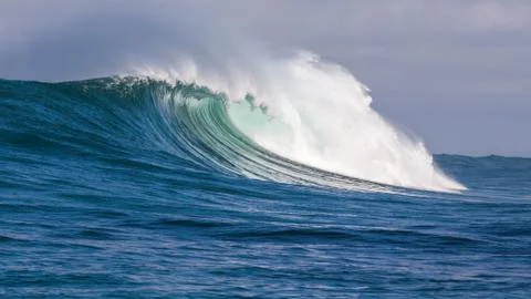 Big waves breaking on an reef along the coast of South Africa Stock Photos
