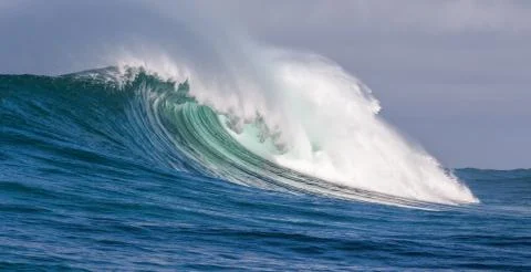 Big waves breaking on an reef along the coast of South Africa Stock Photos
