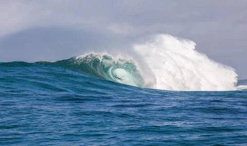 Big waves breaking on an reef along the coast of South Africa Stock Photos