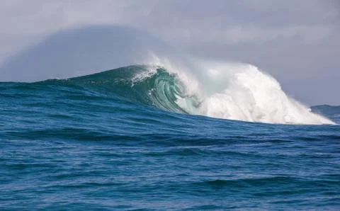 Big waves breaking on an reef along the coast of South Africa Stock Photos