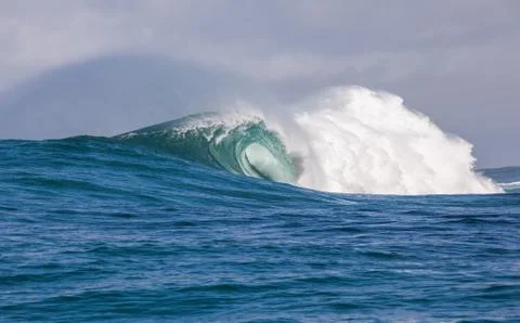 Big waves breaking on an reef along the coast of South Africa Stock Photos