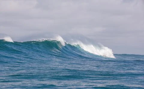 Big waves breaking on an reef along the coast of South Africa Stock Photos