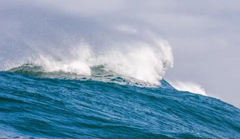 Big waves breaking on an reef along the coast of South Africa Stock Photos
